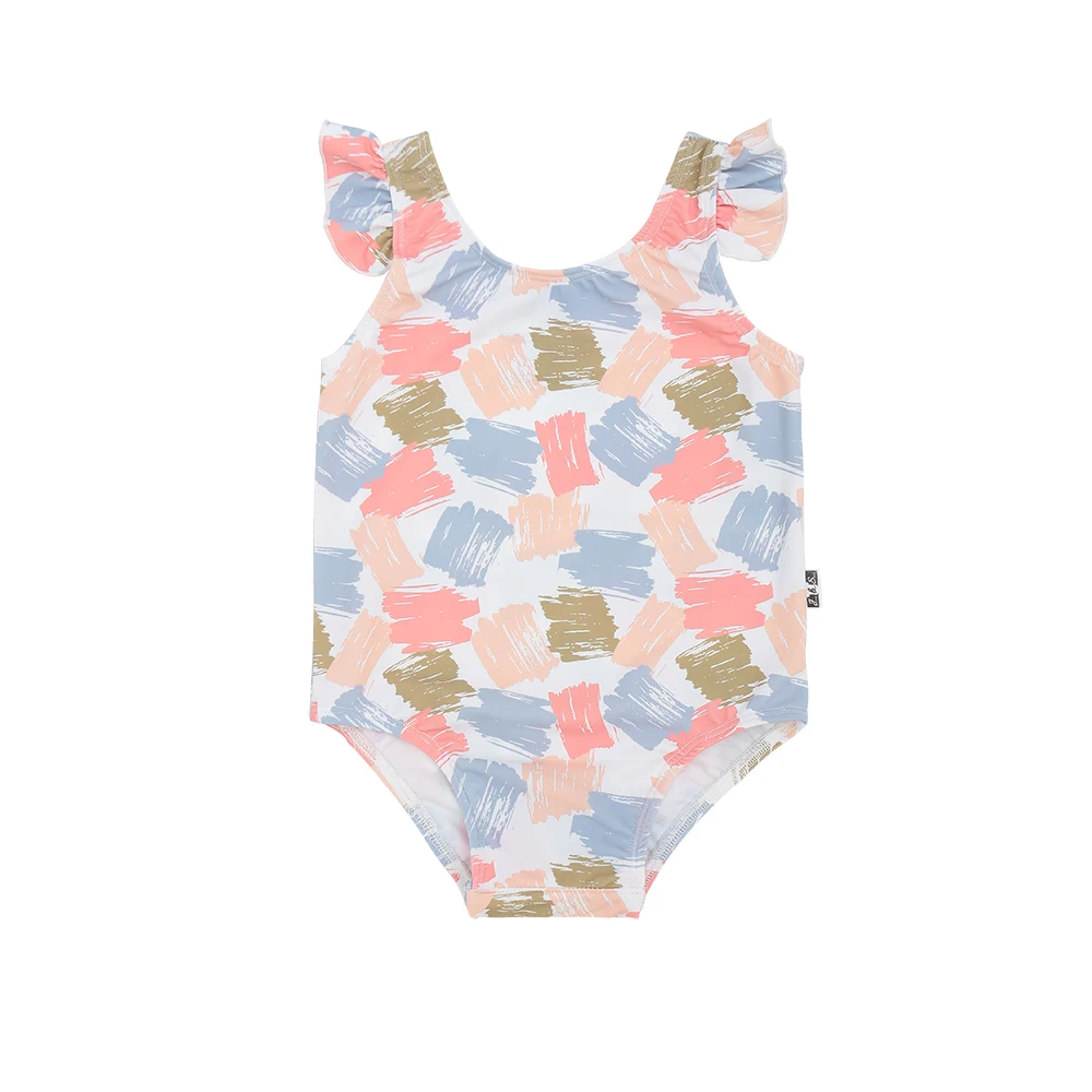 Group of kids in colorful crop tops practicing yoga – ideal apparel for B2B wholesale children's activewear collections.