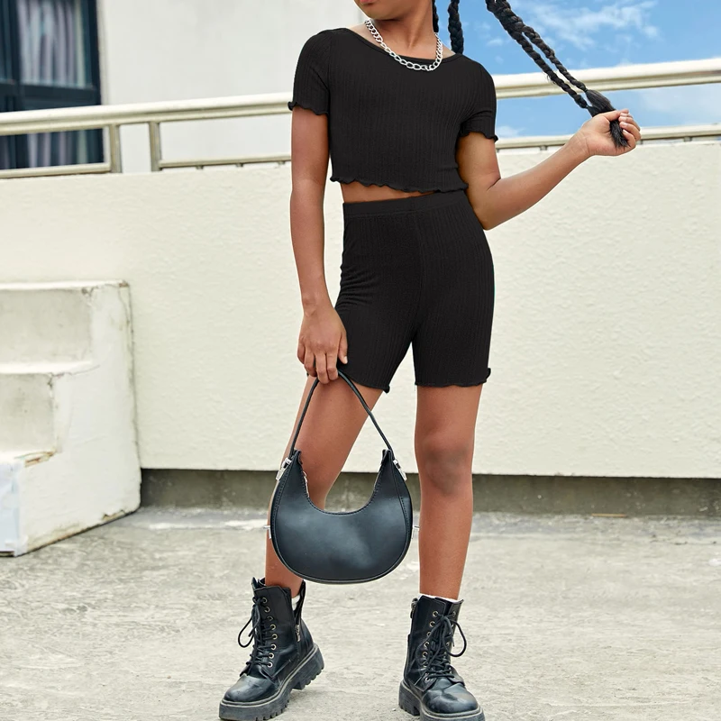 Group of happy kids practicing yoga together, promoting wellness-focused products for schools and B2B wholesale opportunities.