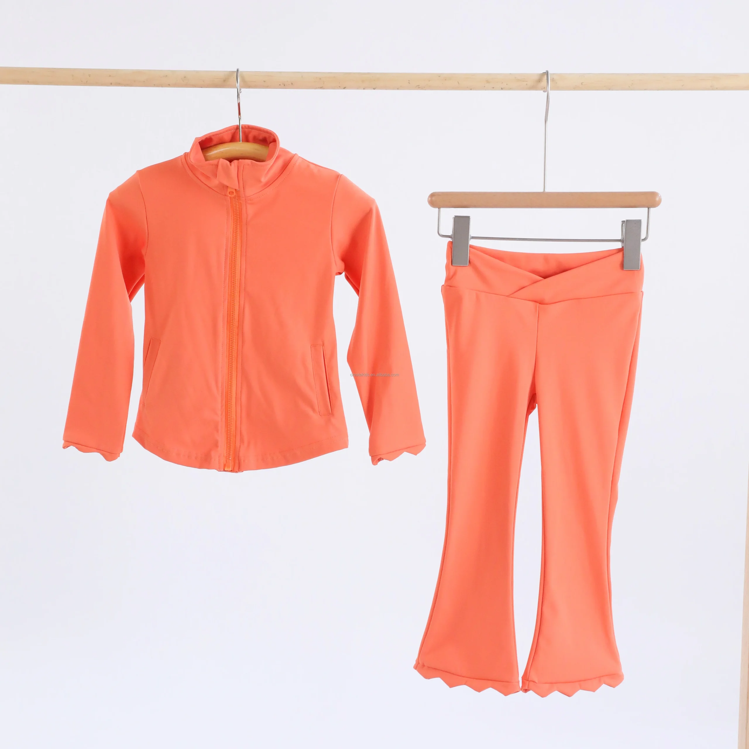 Family yoga session with kids enjoying poses together – ideal for promoting wellness products in B2B wholesale markets.