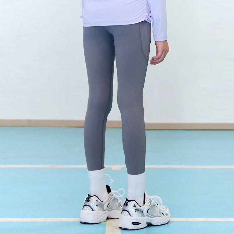 High-performance youth activewear in vibrant designs, ideal for B2B wholesale buyers seeking quality, durability, and trendy athletic apparel.