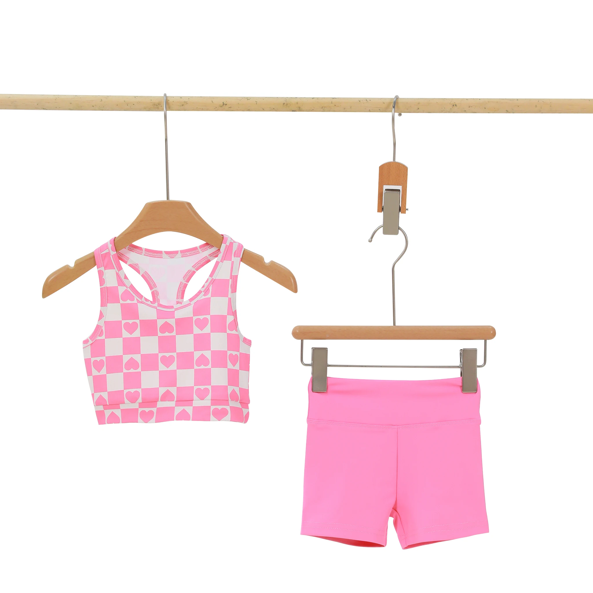 Wholesale kids' yoga wear collection featuring comfortable, durable designs for retailers seeking quality activewear for young customers.