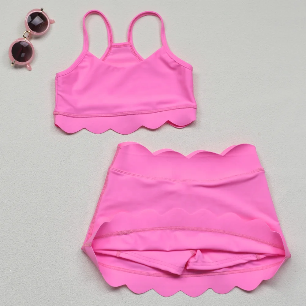 Wholesale kids leggings featuring ocean plastic designs, promoting sustainability and eco-friendly fashion for conscious B2B buyers.