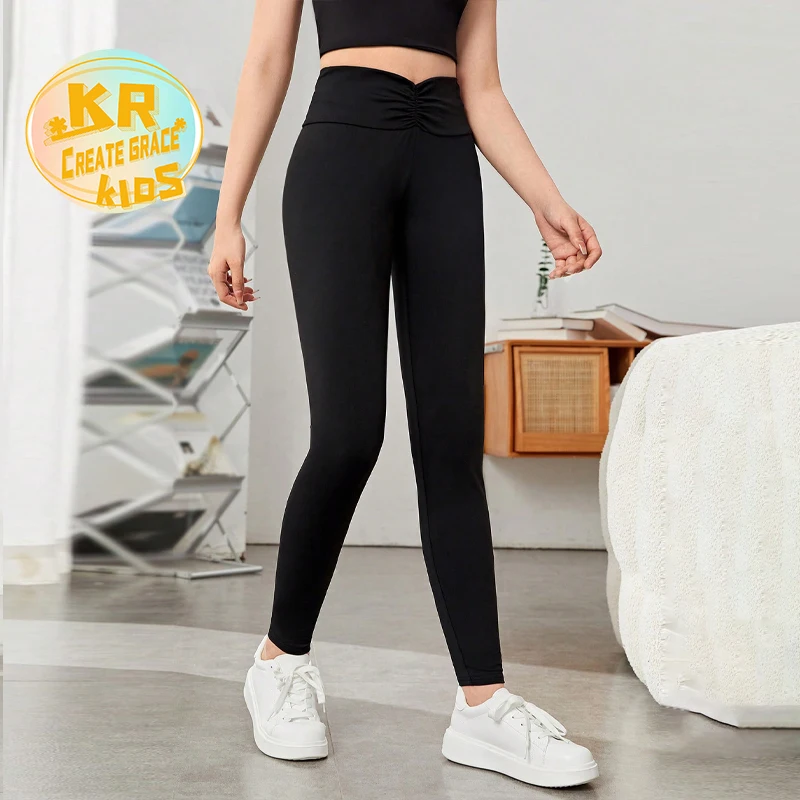 Wholesale racerback kids yoga bras in vibrant colors, designed for comfort and flexibility during active sessions. Perfect for B2B bulk orders.