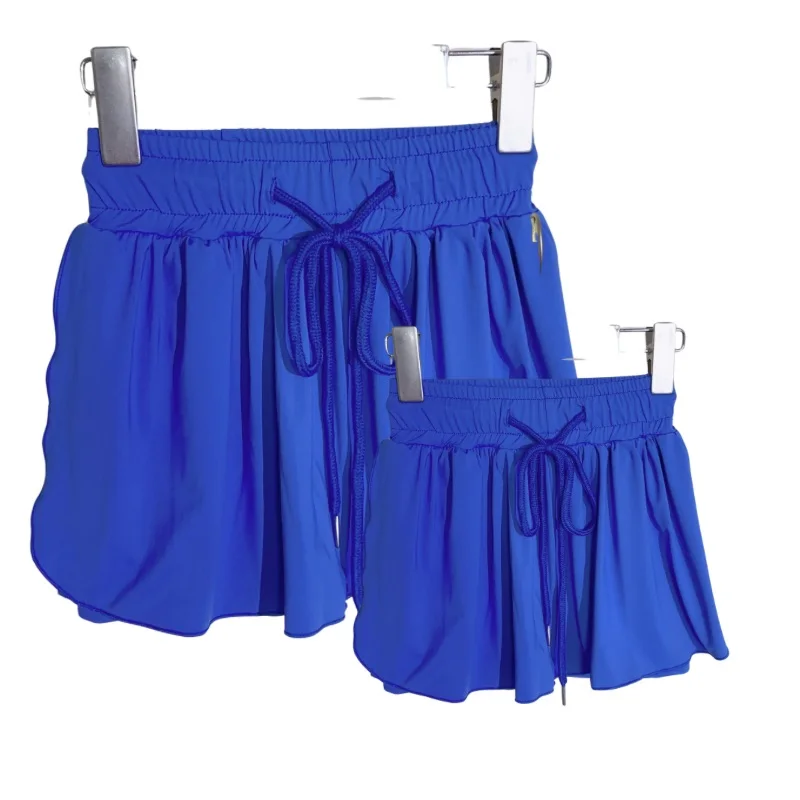 Wholesale personalized kids yoga clothes in vibrant designs, perfect for retailers seeking quality, customizable activewear for children’s yoga classes.