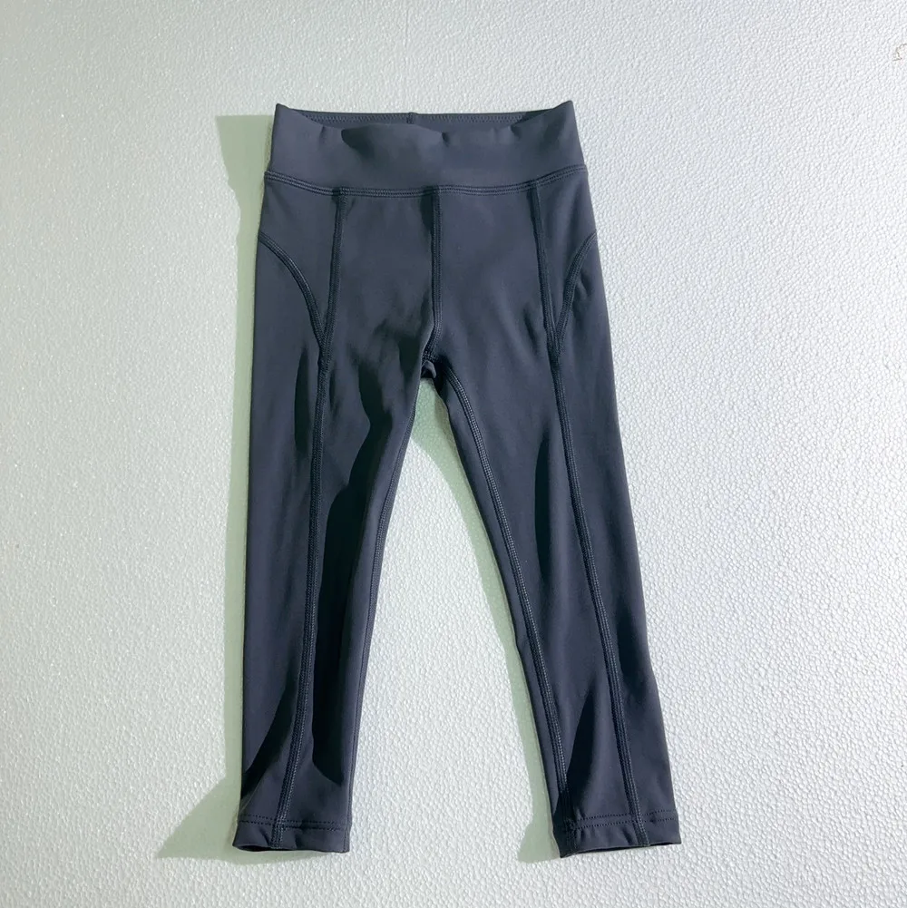 Wholesale kids' ice activewear: Durable, stylish, and performance-driven apparel designed for active children, perfect for retailers and bulk buyers.