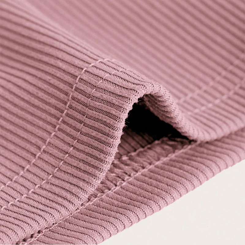 Kids practicing yoga in a vibrant jungle-themed setting, showcasing playful wholesale yoga equipment designed for child-focused businesses.