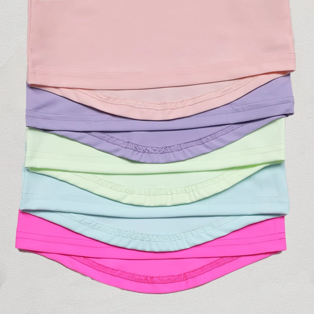 Children practicing soft-touch yoga in a serene studio, showcasing ideal wellness products for B2B wholesale opportunities in kids' fitness.