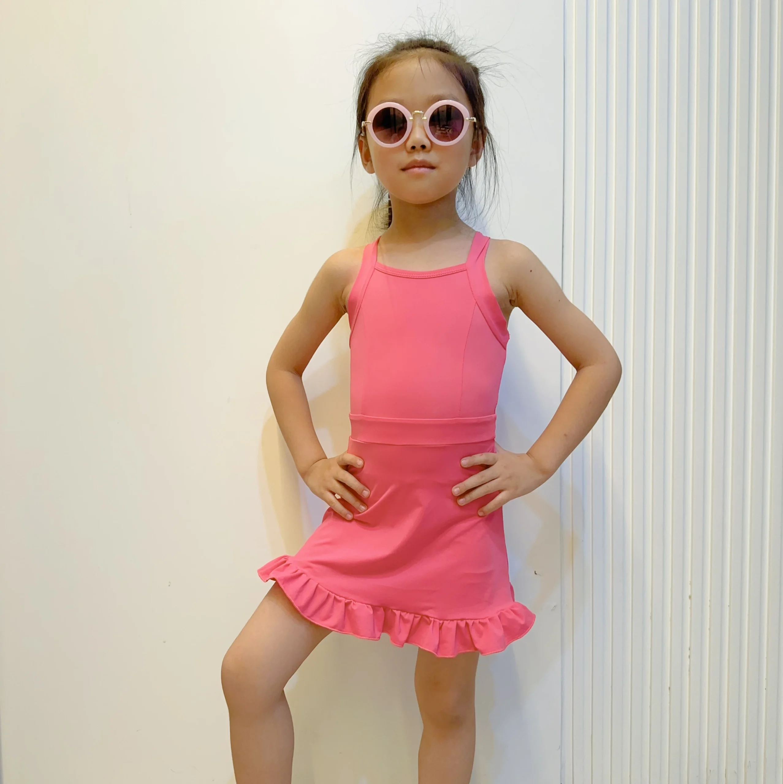 Kids practicing parent-approved yoga poses in a cheerful studio, ideal for B2B wholesale promotions of children’s wellness programs and products.