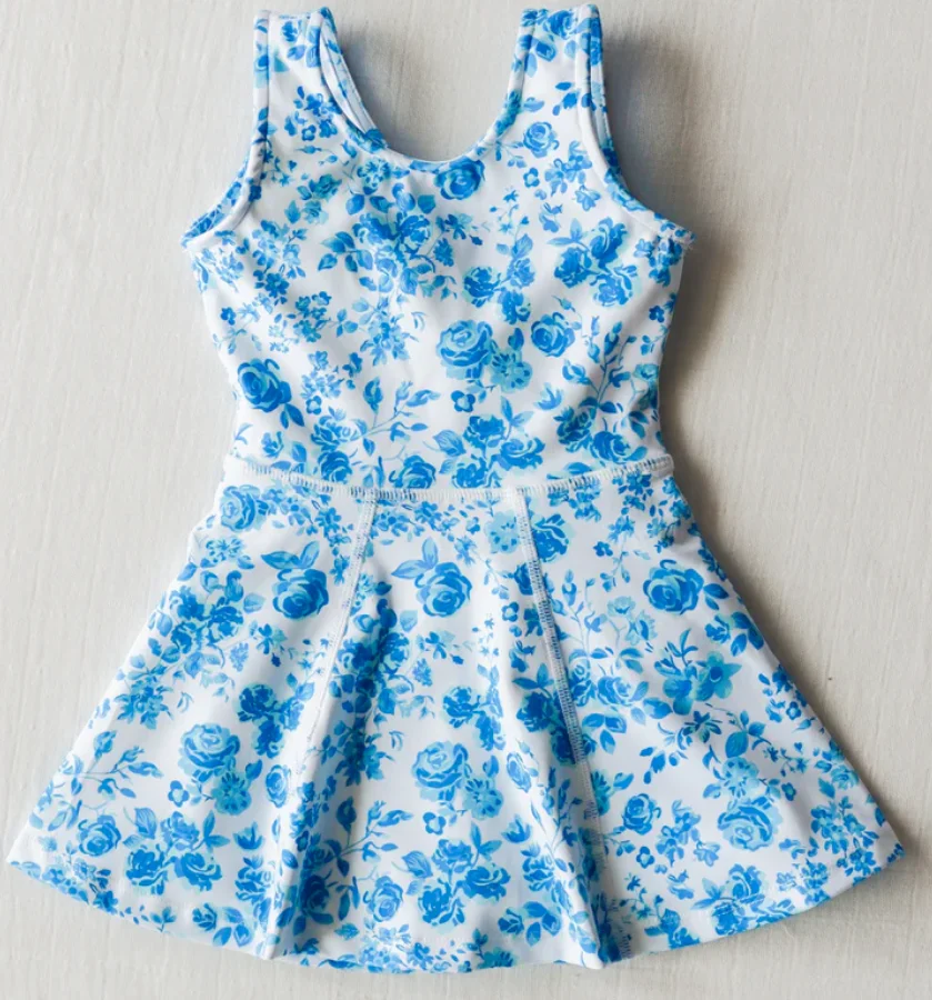 Wholesale girls' navy blue gym tights, durable and stylish activewear perfect for bulk purchase by retailers and fitness brands.