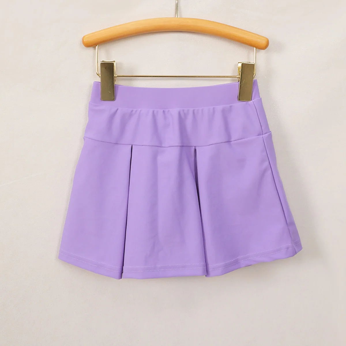 Wholesale padded kids' yoga bras for activewear retailers – comfortable, durable, and perfect for young athletes. Bulk orders available.