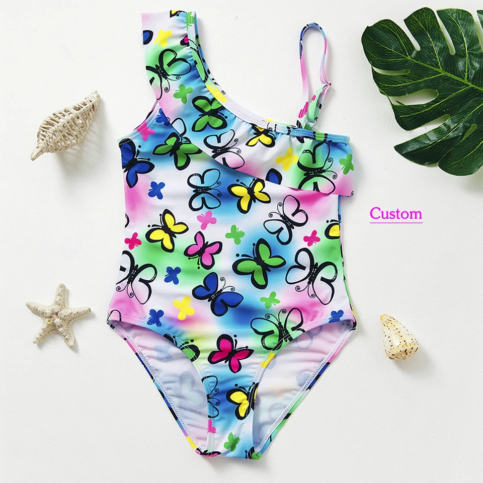 Wholesale racerback kids yoga bras displayed in vibrant colors, ideal for retailers seeking quality activewear for young customers.