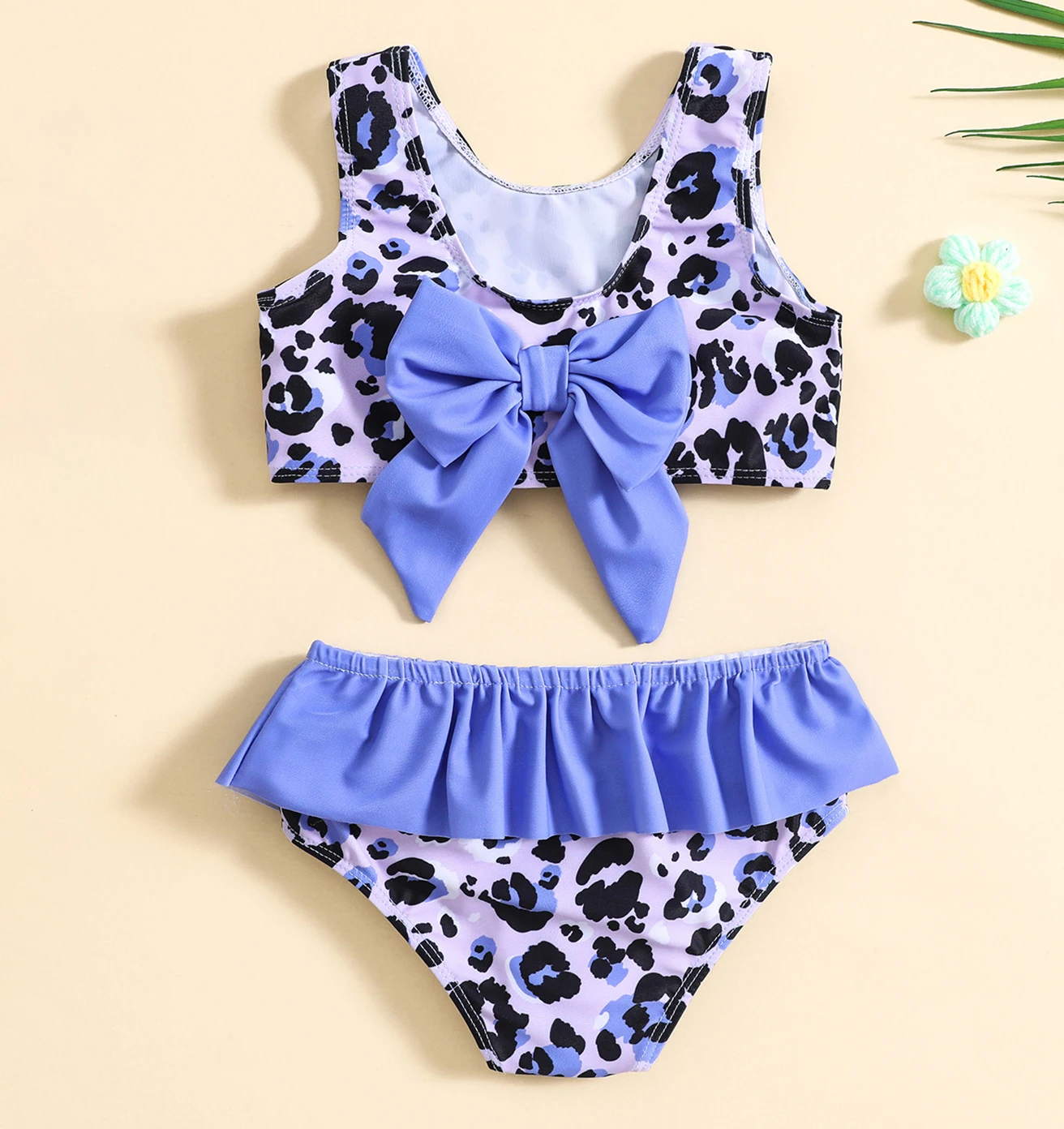 Wholesale youth zip front gym tops in various colors, perfect for retailers seeking quality activewear for young athletes.